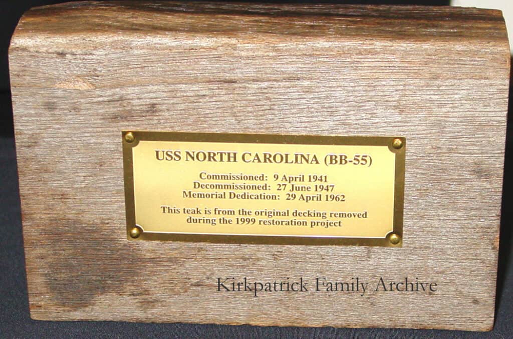 Teakwood plank from original decking of USS North Carolina given to John E. Kirkpatrick